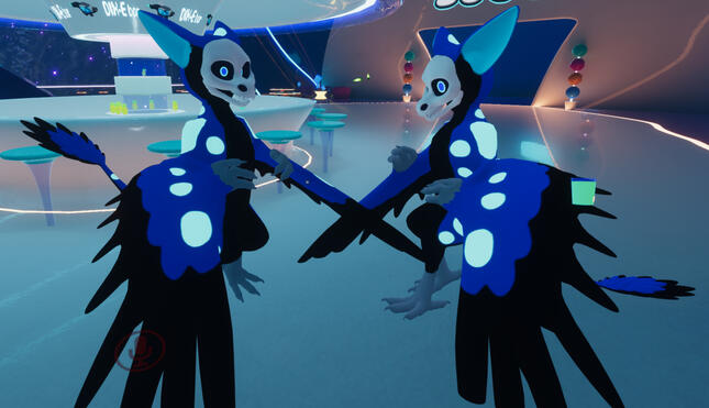 Two players in the same crylan model with a skull head and a very blue color palette. Screenshot taken in Furality 2020's lobby. (designed by me based on my Crylan Avatar Base V1, public)